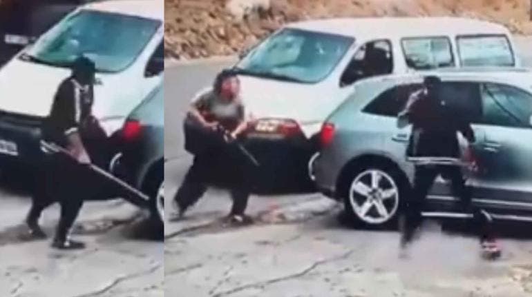 (video) Hombre amenaza a una mujer con un tubo, pero ella responde con una escopeta