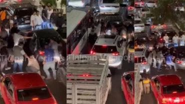 Manifestantes golpeando a gente