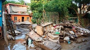 van 65 muertos lluvias Sheinbaum.jpg