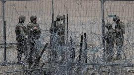 migrantes Texas guardias balas goma