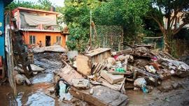 van 65 muertos lluvias Sheinbaum.jpg