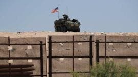 Vehículo blindado con la bandera de Estados Unidos, en la frontera de Ciudad Juárez