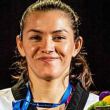 María Espinoza y sus medalllas olímpicas.jpg