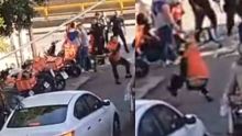 (video) Repartidores de aplicación golpean a policías en Río San Joaquín