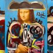 El artista español radicado en EU, Domingo Zapata, donde se aprecia su obra 'Mona Lisa Torera' que se vendió por más de un millón de dólares en una subasta realizada en una gala benéfica de Unicef en la isla caribeña de San Bartolomé.