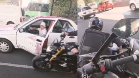 VIDEO | Taxista provoca accidente al intentar pelear con motociclista
