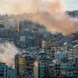 El humo se eleva desde los edificios destruidos después de los ataques israelíes en los suburbios del sur de Beirut, Líbano,
