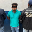 Tras realizarle una revisión preventiva, los elementos encontraron entre sus pertenencias un arma de fuego corta, un cargador y siete cartuchos útiles. (Foto: SSC)