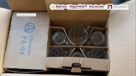 Autoridades aduaneras aseguran más de 10 millones de cigarros localizados en un contenedor que había sido declarado con vasos de vidrio, en la aduana de Lázaro Cárdenas, Michoacán. (Gabinete de Segurida Autoridades aduaneras aseguran más de 10 millones de cigarros localizados en un contenedor que había sido declarado con vasos de vidrio, en la aduana de Lázaro Cárdenas, Michoacán. (Gabinete de Segurida